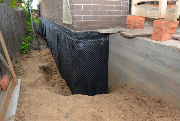 SJ Waterproofing Pros technician performing targeted Foundation Crack Repair assessment in Lockport, NY